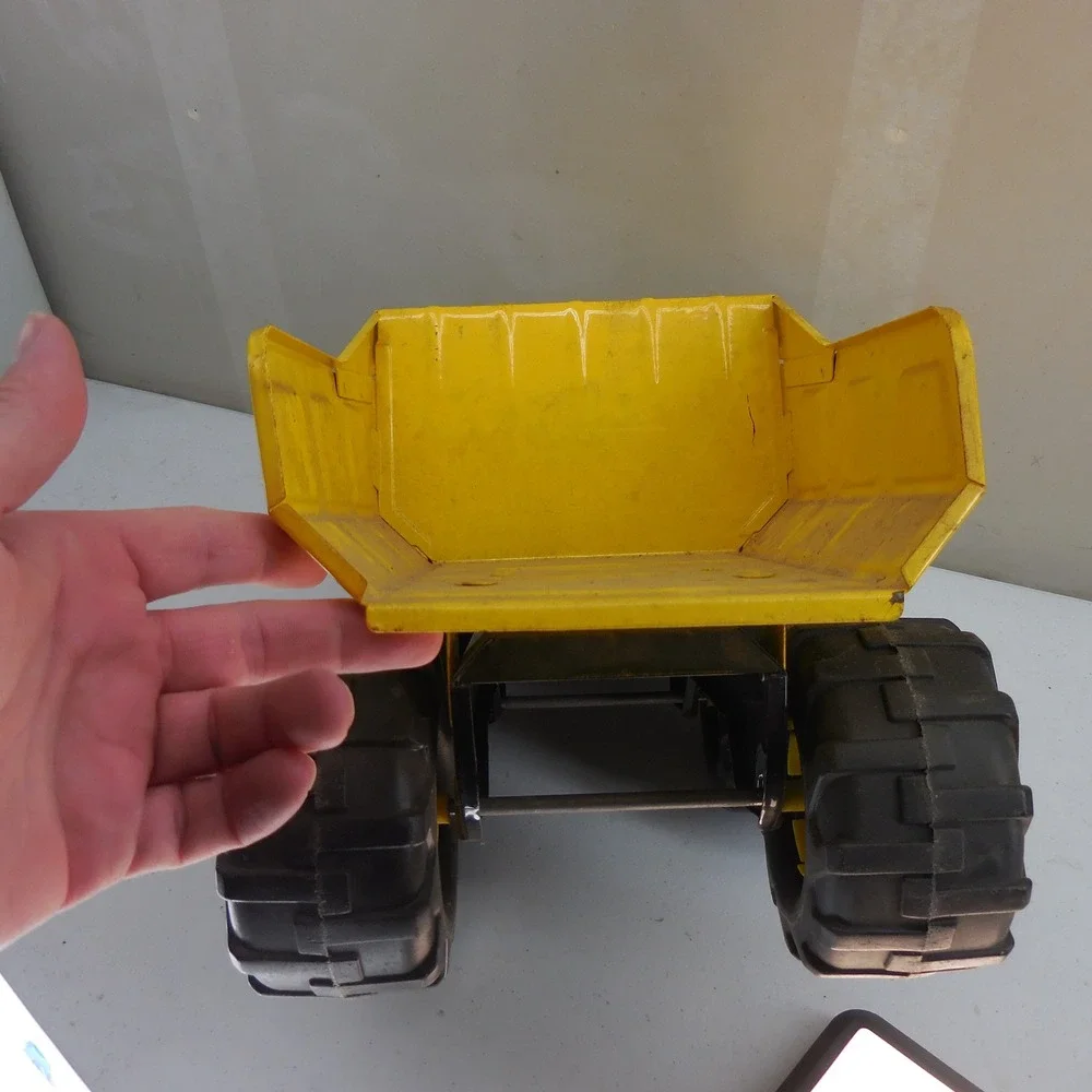Vintage Tonka Mighty Diesel Dump Truck Yellow Pressed Steel Construction Toy